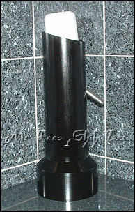Image:Dog or cat water bottle stand, shown in black, side view, with 32oz dog or cat water bottle.